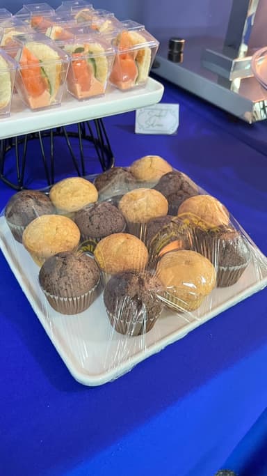 Chocolate and vanilla muffins on a catering table